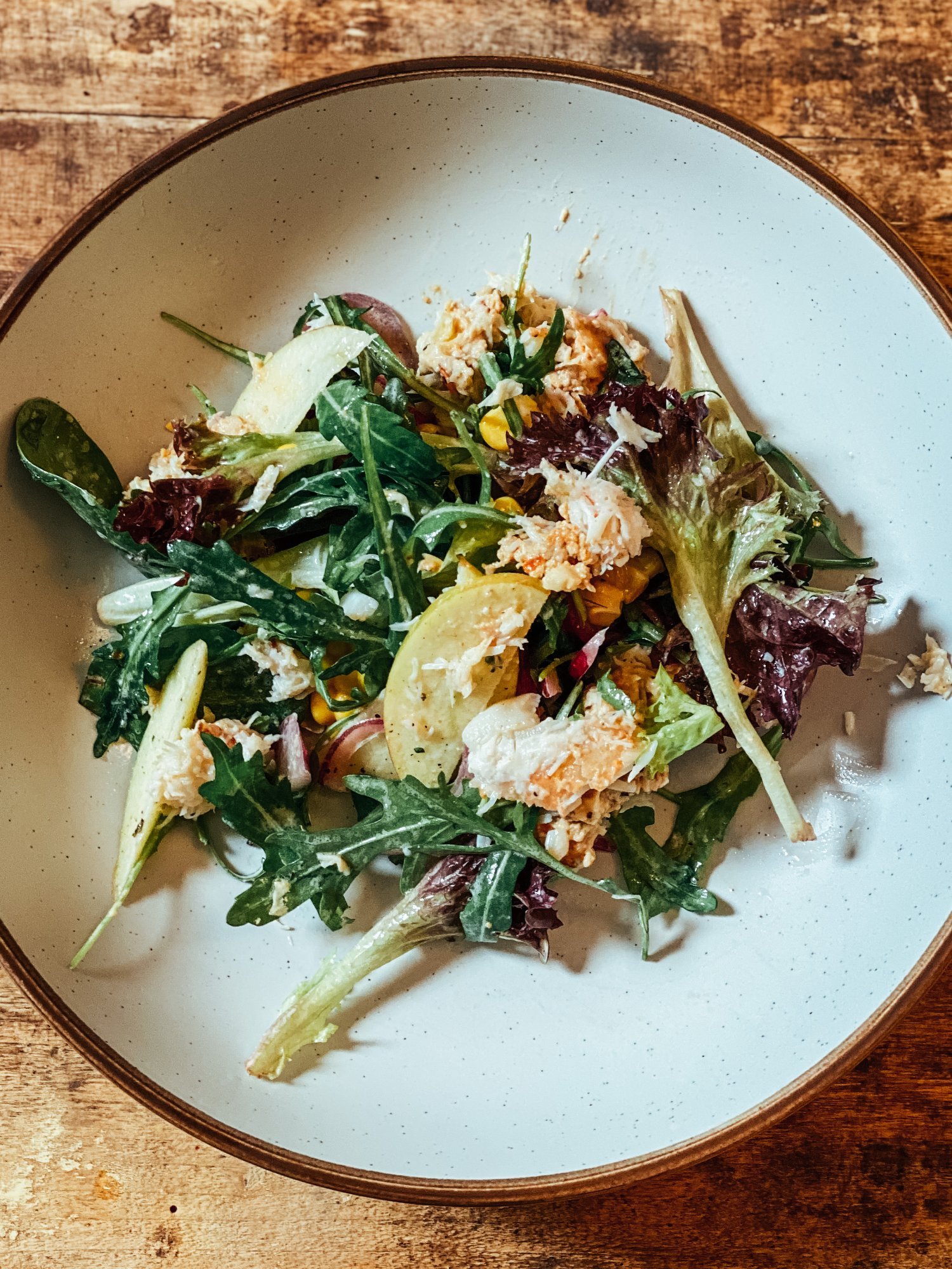 Crab and apple salad with seasonal leaves
