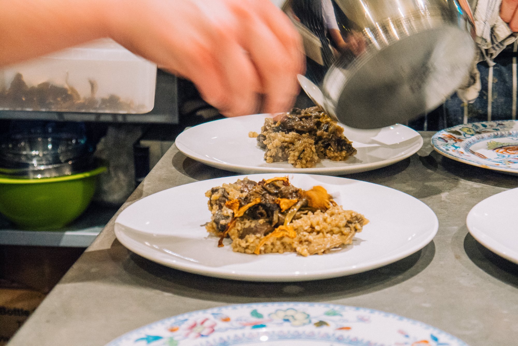 Plating dishes at a supper club